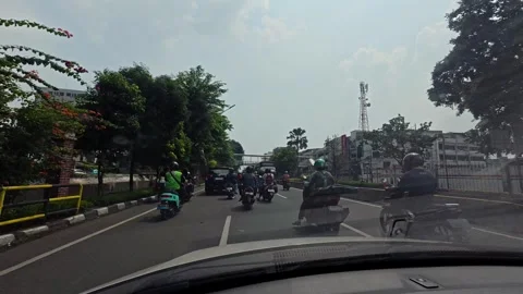 Fast-Moving Urban Traffic Captured from Car Dashboard, Timelapse format Stock Footage 322223660