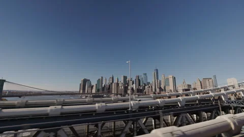 Fast moving view from Manhattan Bridge with Lower Manhattan skylin Stock Footage 332970757