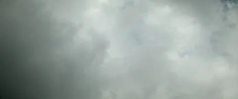 Fast moving white clouds blue sky scope Stock Footage 242791283