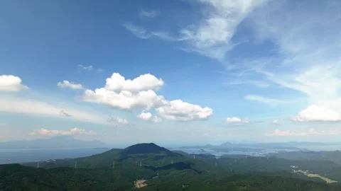 Fast Moving White Clouds in Bright Blue Sky Timelapse Stock Footage 336389264
