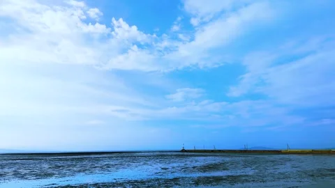 Fast Moving White Clouds in Bright Blue Sky Timelapse Stock Footage 336390853