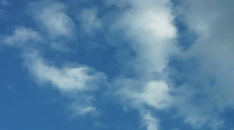 Fast moving white clouds on a sunny day 4k Video stock 49211383