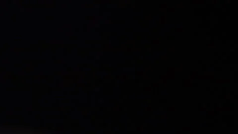 Fast moving white flashing light in the dark 動画素材 309429699