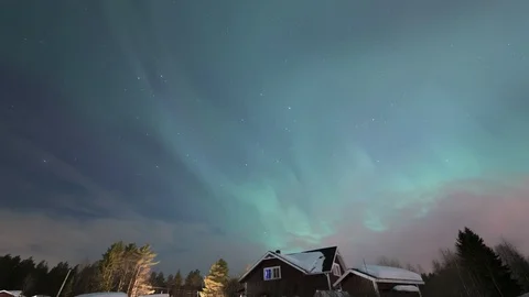 Fast moving winter clouds with aurora northern lights short timelapse Sweden Stock Footage 89960986