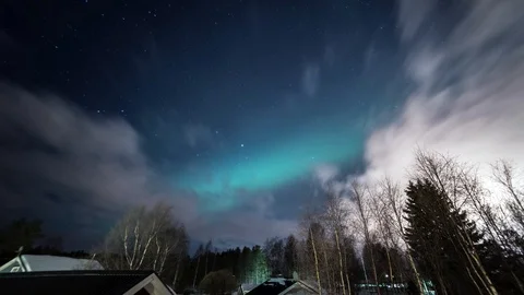 Fast moving winter clouds with aurora northern lights short timelapse Stock Footage 89961072