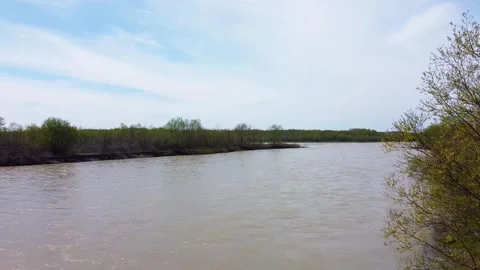 Fast muddy river drone going up Stock Footage 241219355