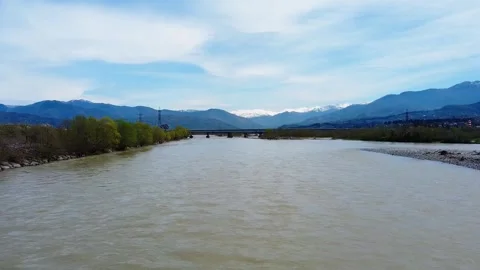 Fast muddy river drone going down Stock Footage 241219694
