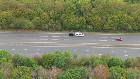 Fast Multi Lane Highway Road with Trees in Surrey, UK. Stock Footage 346375497