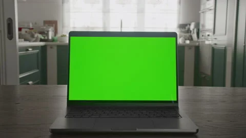 Fast optical zoom in into a laptop computer monitor with green screen chroma key Stock Footage 207058582
