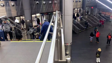 Fast-paced subway station timelapse capturing commuter flow in New York City Stock Footage 324943204