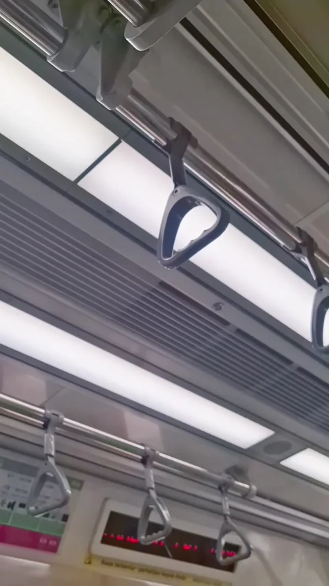 In a fast-paced subway train. Interior of an old NYC Subway car, Surabaya Stock Footage 283960698