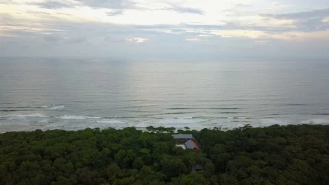 Fast panning flight down Playa Grande shoreline Stock Footage 91014401