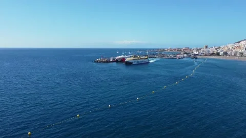 Fast passenger ferry Bencomo Express departing Los Cristianos. Stock Footage 169315296