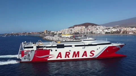 Fast passenger ferry Volcan de Teno Arriving port of Los Cristianos, Tenerife. Stock Footage 168984015