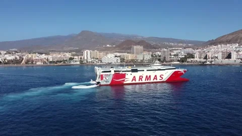 Fast passenger ferry Volcan de Teno Arriving port of Los Cristianos, Tenerife. Stock Footage 168984042