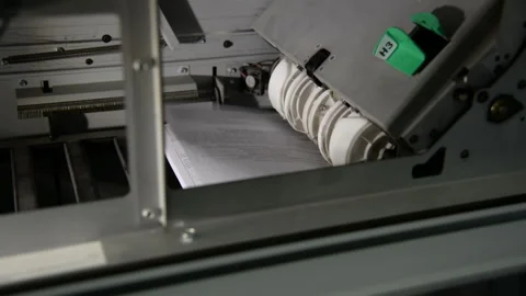 Fast printer prints hundreds of paper invoices for payment - Digital Press Stock Footage 102369537