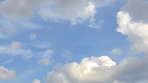 Fast puffy clouds Stock Footage 21983439