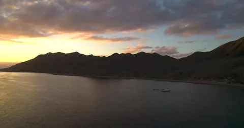 Fast push into Mountain Range in Magdalena Bay Mexico at Sunrise Stock Footage 334638590