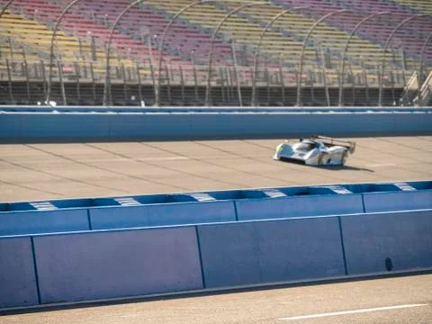 Fast Race Car Speeding Down Track 写真素材