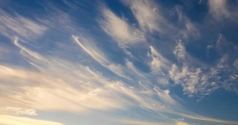 Fast racing cirrus clouds at sunset Stock Footage 118964864