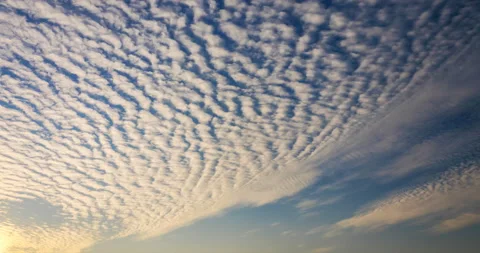 Fast racing cirrus clouds at sunset Stock Footage 118969241