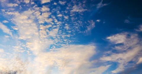 Fast racing cirrus clouds at sunset Stock Footage 120332400