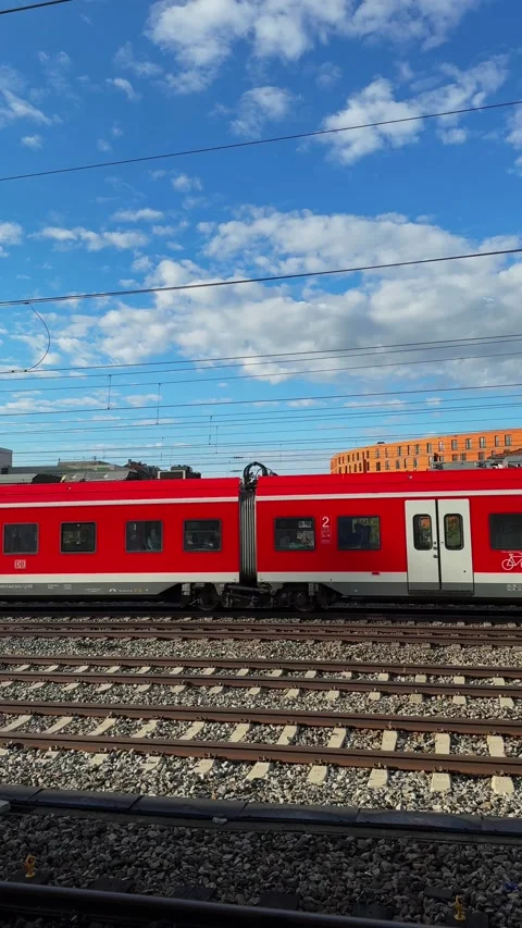 Fast red train on the railway tracks Stock Footage 322063015
