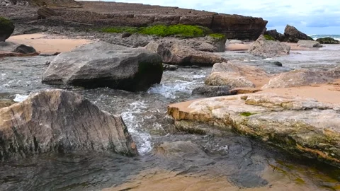 Fast River Stream Flowing Toward Atlantic Ocean at Praia das Maçãs Stock Footage 325975102