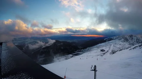 Fast running clouds over Low Tatras with magic sunset. Chopok mountain  Stock Footage 58896523