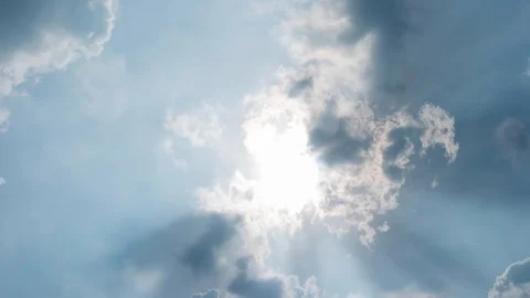 Fast speed cloud moving pass sun in daylight 4k 30fps footage. Stock Footage 129363802