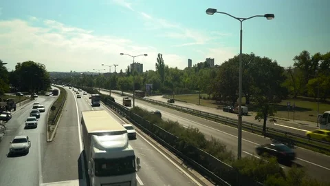 Fast speed drive on freeway in town, rush hour, traffic jam, wide angle view. Stock Footage 82468323