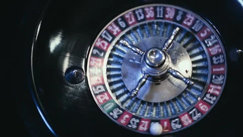 Fast-spinning roulette game with motion blur and moving ball. Stock Footage 335891535