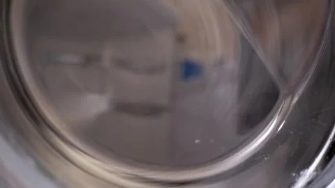 Fast Spinning Washing Machine Drum Cleaning Mixed Laundry Inside Modern Stock Footage 338996807