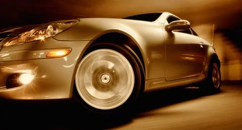Fast sports car with motion blur Stock Photos
