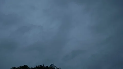 Fast storm hurricane clouds turn sky black Stock Footage 211591178