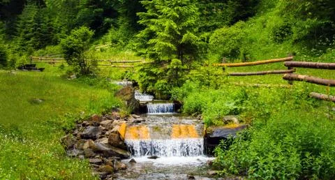 Fast stream with cascade. Stock Photos