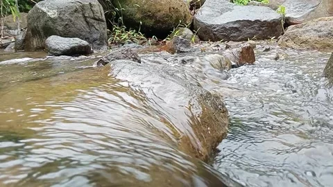 Fast Stream Water Splashing Over Rocks – Dynamic Nature Flow Stock Footage 330552714