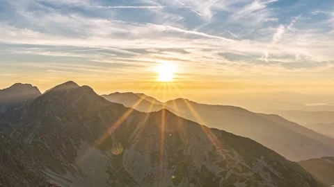 Fast Sunset over rocky alpine mountains nature, adventure travel background Time Stock Footage 254683576