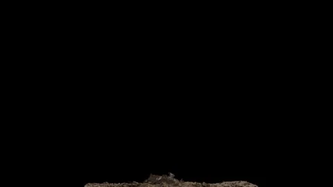 Fast Tactical Dirt Explosion VFX Overlay Against Black Background Stock Footage 336315443