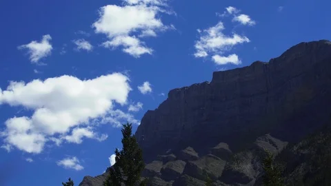 Fast time lapse with clouds during the day of Canadian rocky mountains in Banff Video stock 123173008
