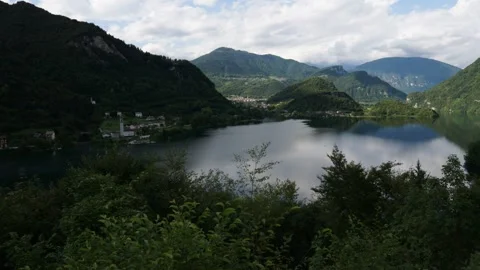 Fast time lapse of the Corlo Lake in the Belluno Dolomites Stock Footage 313956981