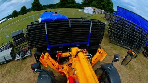 Fast time lapse footage of a JCB digger moving equipment. Stock Footage 10879157