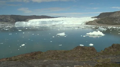 Fast timelapse of moving clouds and shadows on a glacier in Greenland Stock Footage 59998595