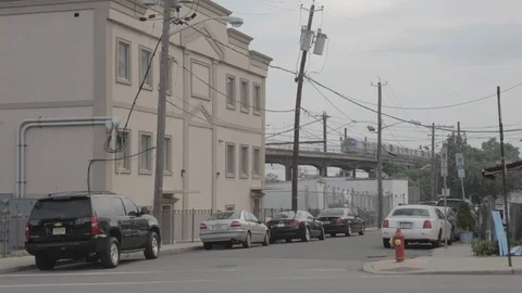 Fast Train Going Over Bridge Above Street Video stock 100851331