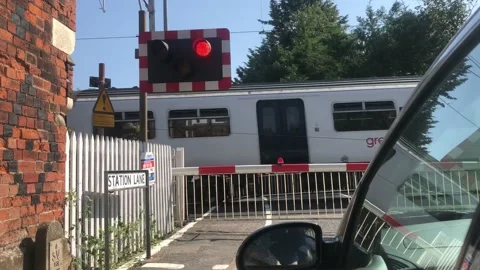 Fast train at level crossing Video stock 139291613
