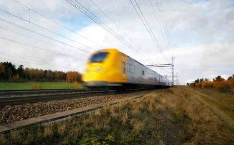Fast train with motion blur Stock Photos