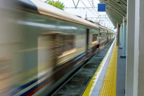 Fast train pass through the station Stock Photos