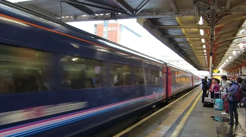 Fast Train Passing Through Station Stock Footage 42384595