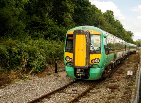 Fast train on tracks Stock Photos