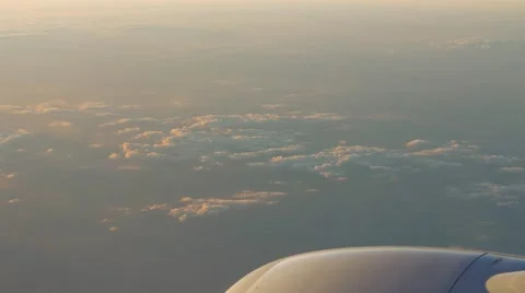 Fast traveling by air. View through an airplane window. Stock Footage 64093066